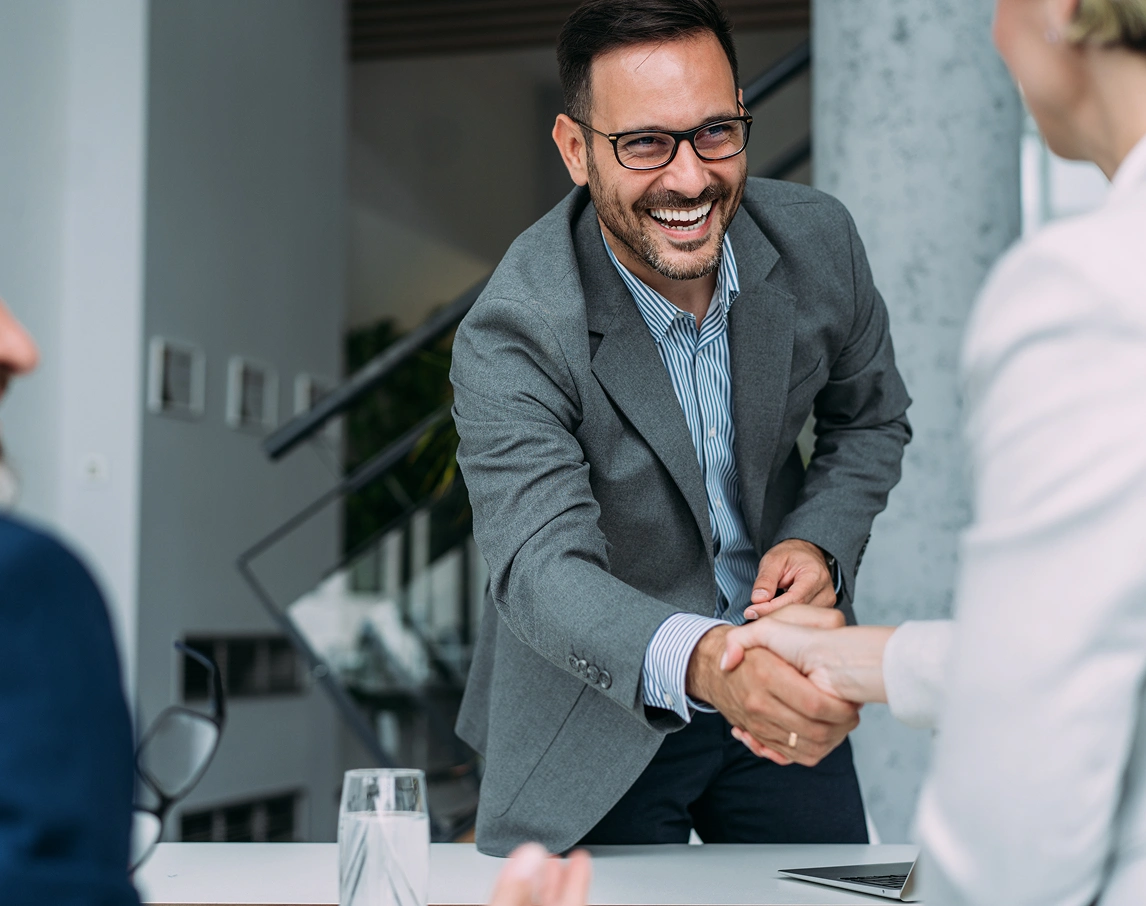 Coworkers shaking hands